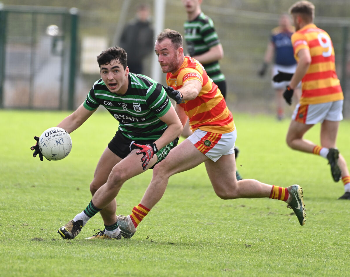 Douglas' David Buckley wins the ball from Newcestown's Colm Dinneen at Newcestown. Picture: Eddie O'Hare