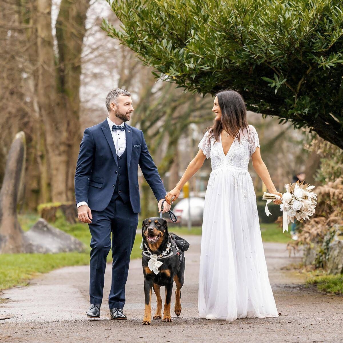 Kate and Seán Philpott with their dog, Burleigh, on their wedding day in February 2024. Kate and Seán Philpott with their dog, Burleigh, on their wedding day in February 2024.