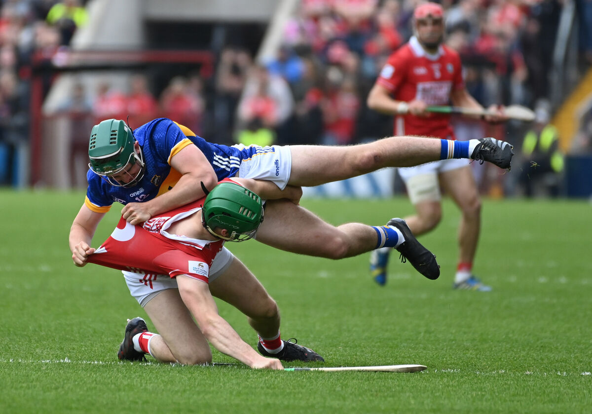 Cork's Seamus Harnedy tussles with Tipperary's Sam O'Farrell. Picture: Eddie O'Hare Cork's Seamus Harnedy tussles with Tipperary's Sam O'Farrell. Picture: Eddie O'Hare