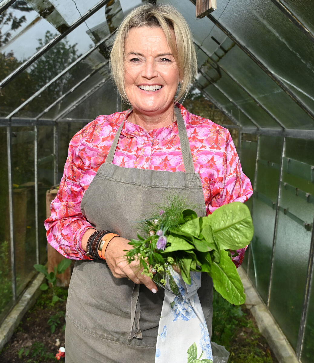 Claire Nash, with fresh lettuce and herbs at home in Kinsale, Picture: Eddie O'Hare