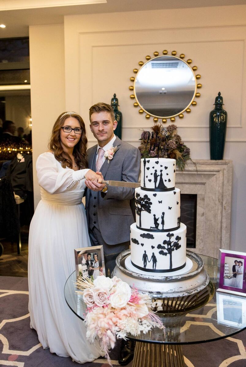 "Our silhouette cake was from the talented Ruairi's Kitchen and it was delicious," the couple said. "Our silhouette cake was from the talented Ruairi's Kitchen and it was delicious," the couple said.