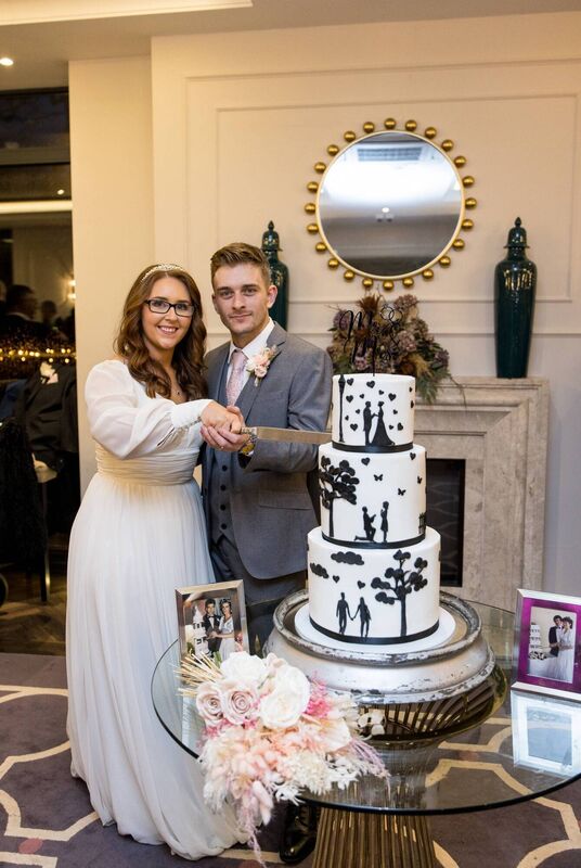 "Our silhouette cake was from the talented Ruairi's Kitchen and it was delicious," the couple said. "Our silhouette cake was from the talented Ruairi's Kitchen and it was delicious," the couple said.