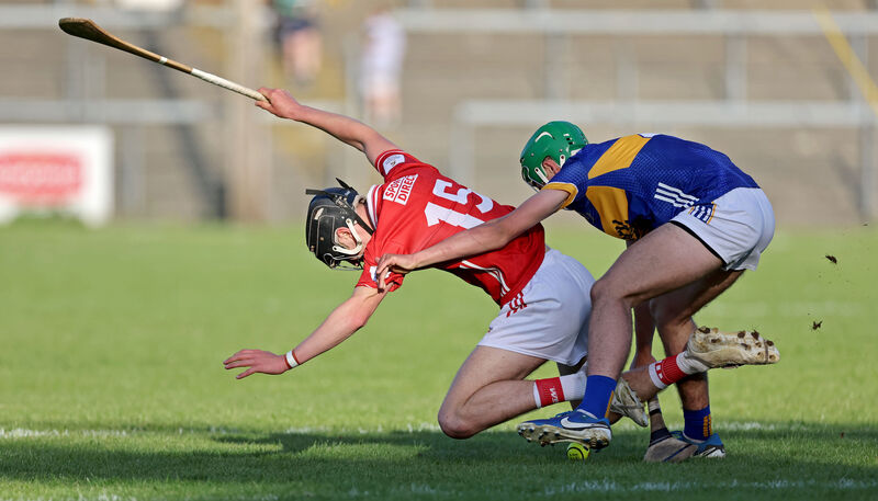 Cork's Sam Ring battles for possession against Tipperary's Conor Collins. Picture: Jim Coughlan Cork's Sam Ring battles for possession against Tipperary's Conor Collins. Picture: Jim Coughlan