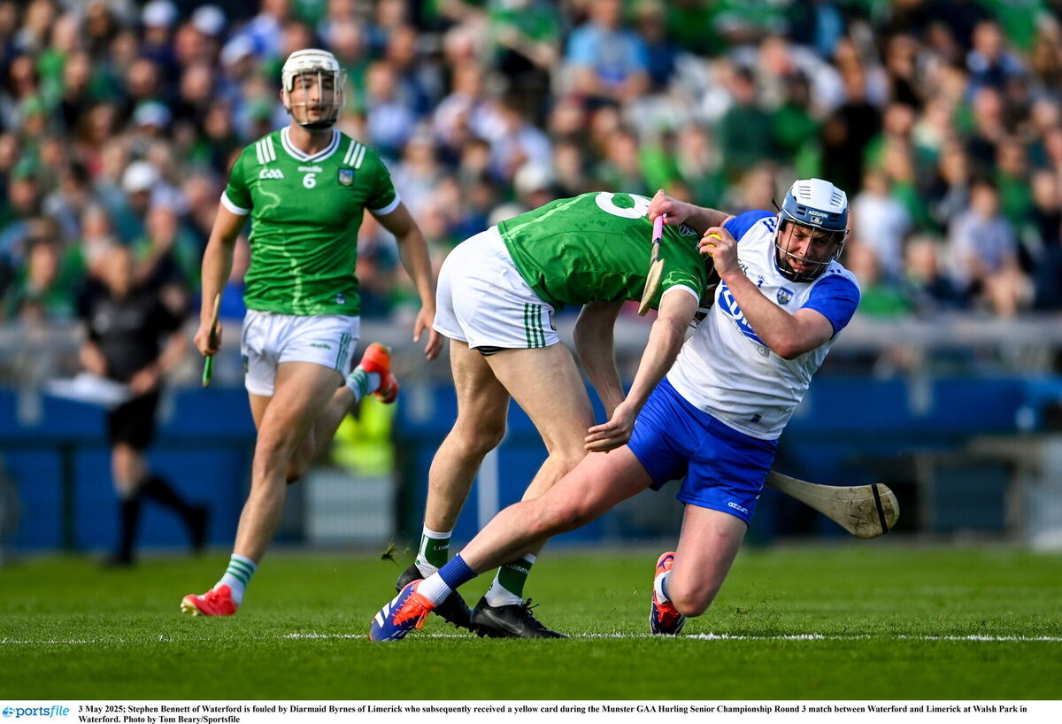 Stephen Bennett of Waterford is fouled by Diarmaid Byrnes of Limerick, who subsequently received a yellow card. Picture: Tom Beary/Sportsfile