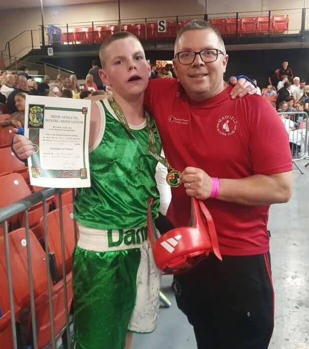 Dan Fitzgerald, Mayfield Boxing Club, after winning his second Irish title with his father and coach Garreth in the National Stadium MOB Dan Fitzgerald, Mayfield Boxing Club, after winning his second Irish title with his father and coach Garreth in the National Stadium MOB