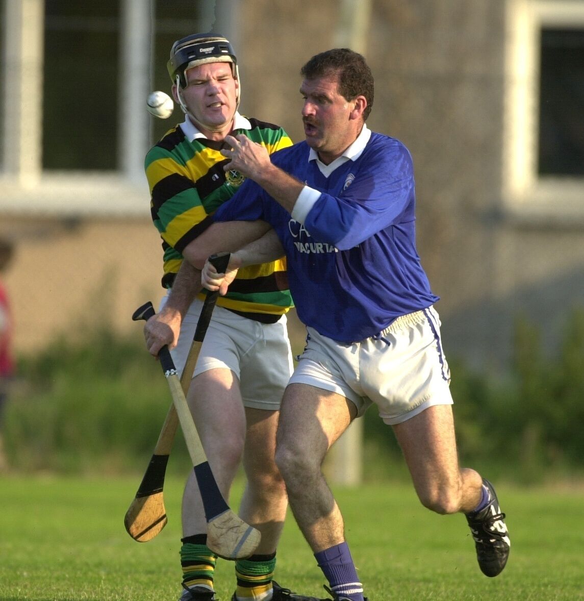Brian Dillons James Corcoran is tackled by GLEN ROVERS Niall Coleman during the City division junior "A' hurling championship quarter final at Ballinlough.