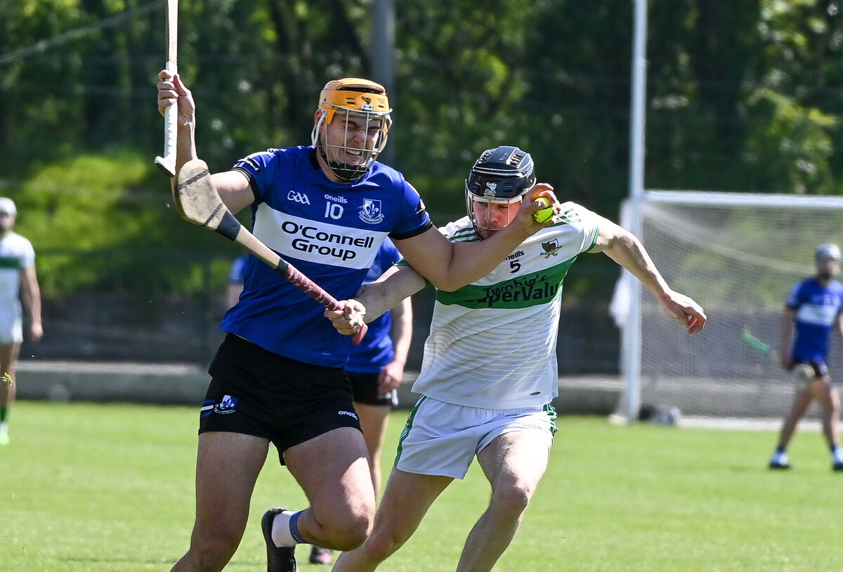  Sarsfields' Luke Elliott tries to hold off Daniel O'Connell of Kanturk. Picture: David Keane