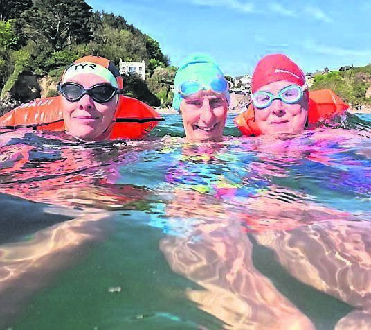 Jess Burke, Wilton, Angela Stubbs, Douglas, and Celine Hyde, Passage West, swimming in Myrtleville last Sunday.