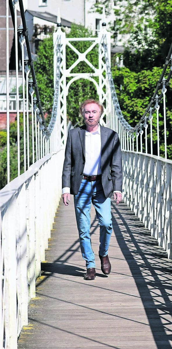 Cahal Dunne on the Shaky Bridge during a take for the video recording of his new song, Cork My Home, at Fitzgerald’s Park. Picture: Jim Coughlan Cahal Dunne on the Shaky Bridge during a take for the video recording of his new song, Cork My Home, at Fitzgerald’s Park. Picture: Jim Coughlan