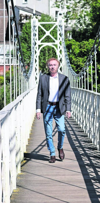 Cahal Dunne on the Shaky Bridge during a take for the video recording of his new song, Cork My Home, at Fitzgerald’s Park.	Picture: Jim Coughlan