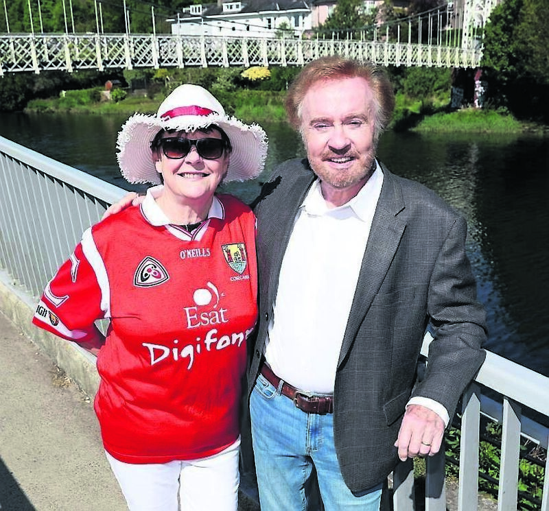 Cahal Dunne during a break from recording his video for Cork My Home, with Bridget Daly, of Ballyphehane. He had issued an open invitation for people to join him for the shoot
