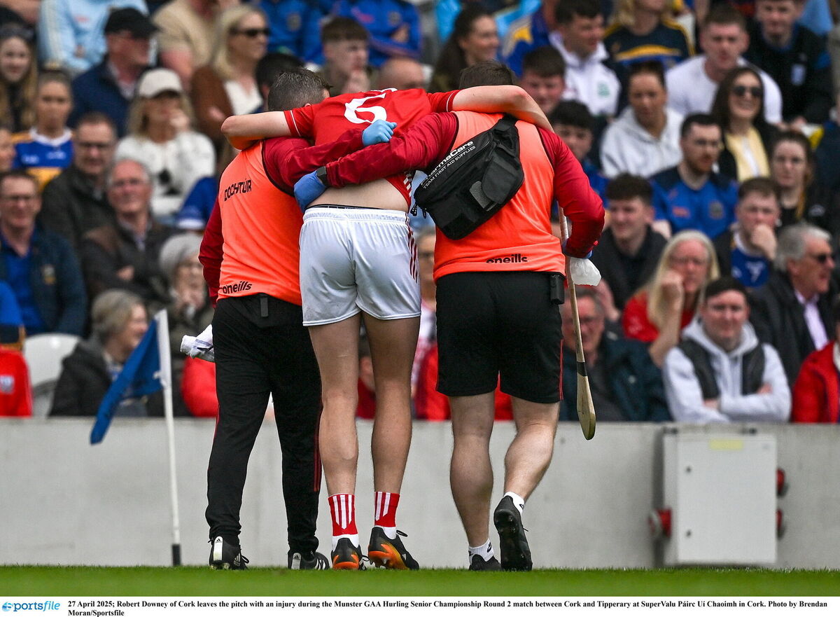 Robert Downey of Cork leaves the pitch with an injury against Tipp. Picture: Brendan Moran/Sportsfile Robert Downey of Cork leaves the pitch with an injury against Tipp. Picture: Brendan Moran/Sportsfile