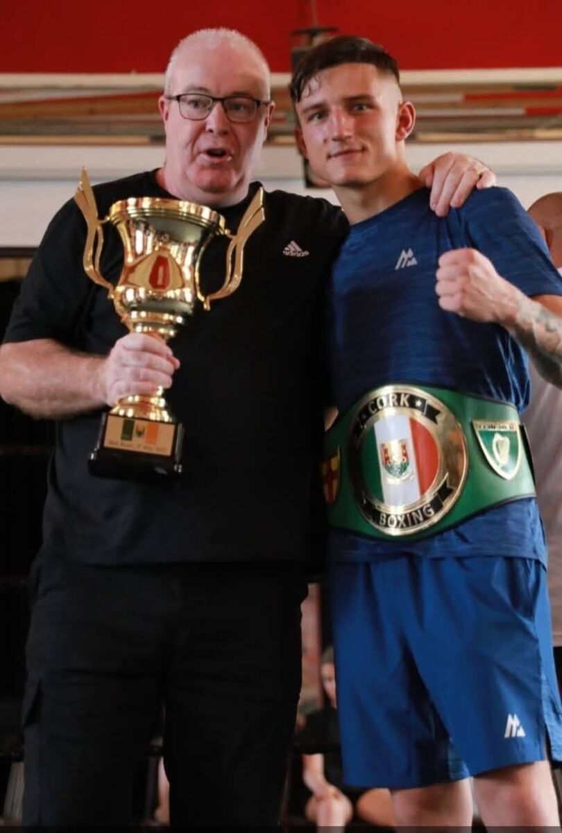 Coach John Morrisey with his boxer Kuba Pielesz, who was presented with the best boxer gold cup at the De Coursey tournament in Bandon 