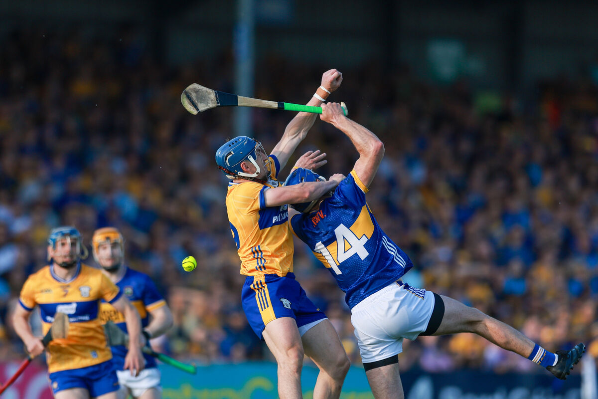 John McGrath of Tipperary in action against Rory Hayes of Clare battle for possession. Picture: ©INPHO/Natasha Barton