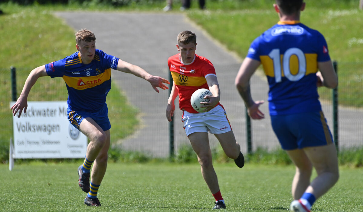 Jack Murphy of Éire Óg under pressure from Pa Mellett of Carrigaline. Picture: Dan Linehan  Jack Murphy of Éire Óg under pressure from Pa Mellett of Carrigaline. Picture: Dan Linehan