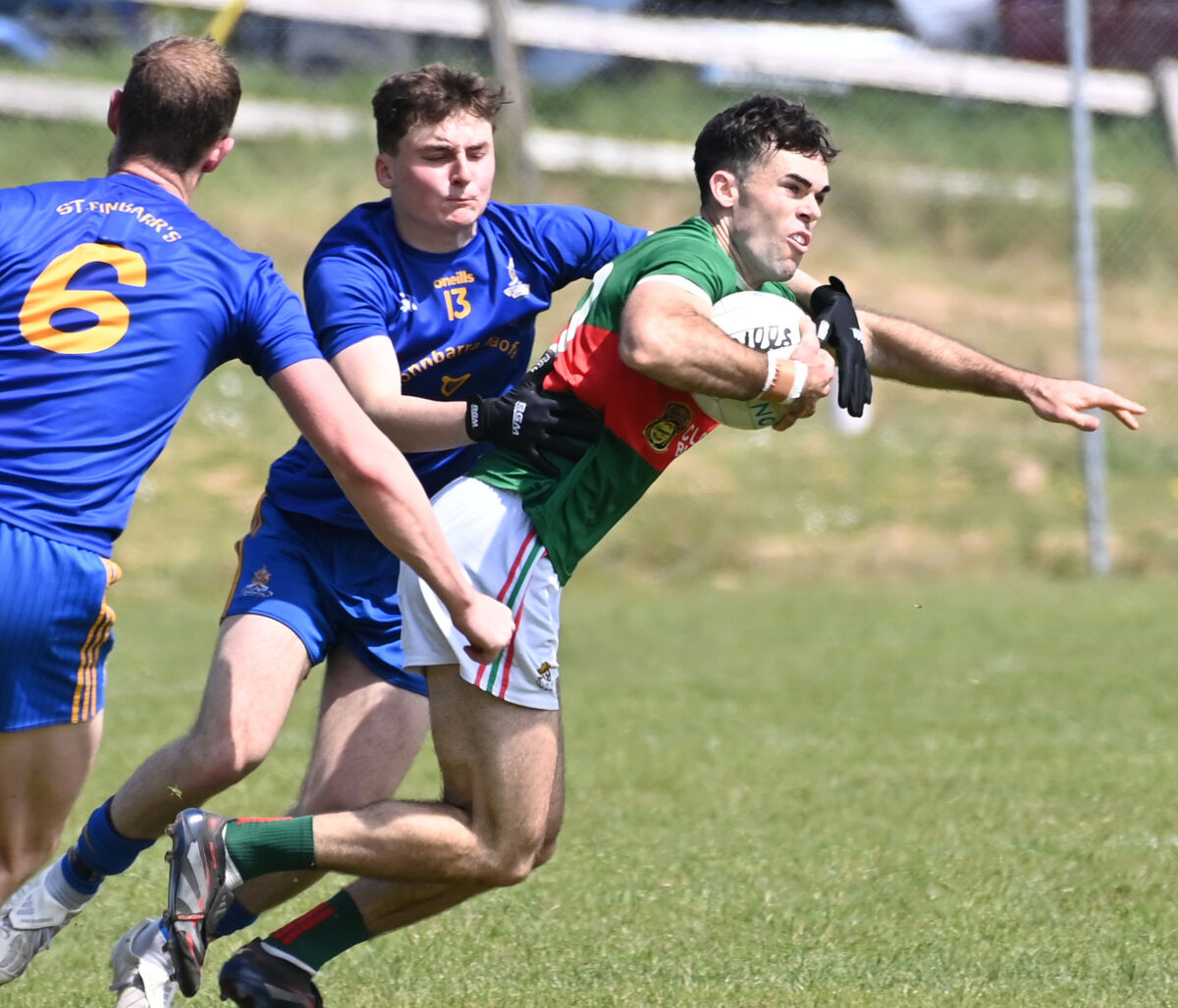 Clonakilty's David Lowney is tackled by St Finbarr's Cian O'Sullivan. Picture: Eddie O'Hare Clonakilty's David Lowney is tackled by St Finbarr's Cian O'Sullivan. Picture: Eddie O'Hare