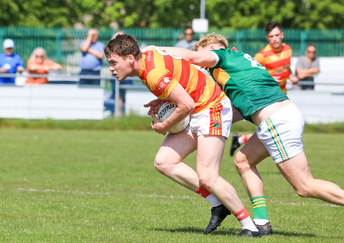 Newcestown David Leahy breaks away from St Michael's Eoin Hickey. Picture: David Creedon Newcestown David Leahy breaks away from St Michael's Eoin Hickey. Picture: David Creedon