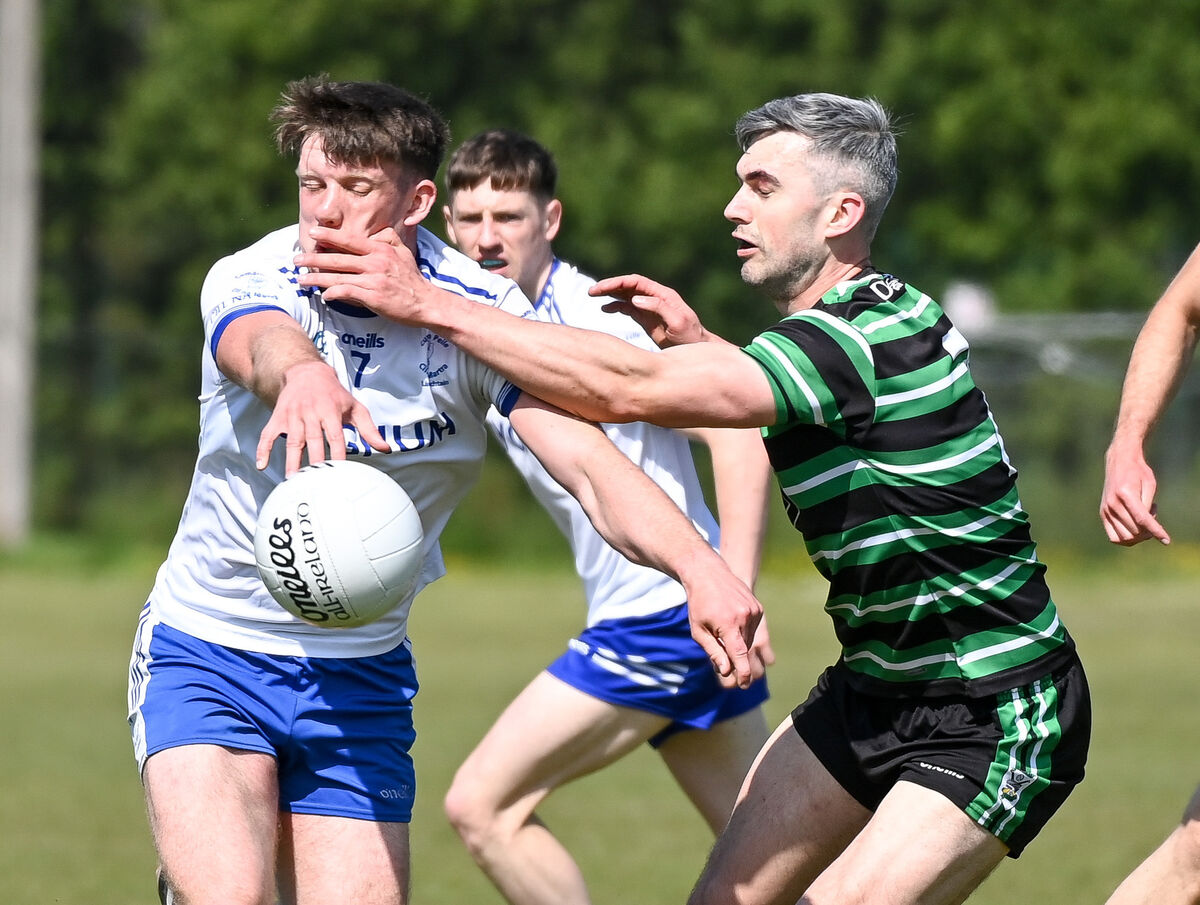 Cill Na Martra's Adam O Duinnin is tackled by Douglas' Conor Kingston. Picture: David Keane.  Cill Na Martra's Adam O Duinnin is tackled by Douglas' Conor Kingston. Picture: David Keane.