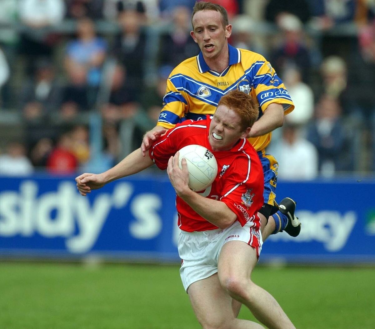 Cork's Seán Levis is tackled by Clare's Noel Griffin in 2004. Picture: Eddie O'Hare
