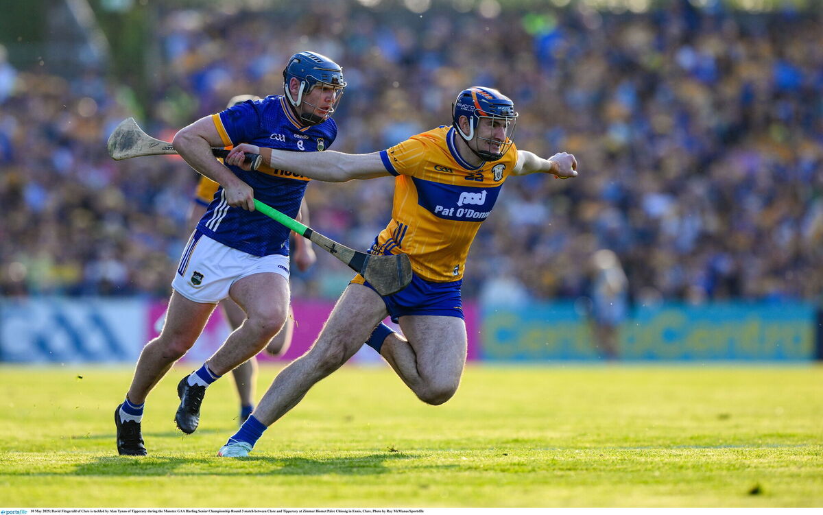 David Fitzgerald of Clare is tackled by Alan Tynan of Tipperary. Picture: Ray McManus/Sportsfile
