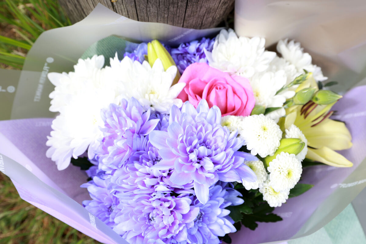 Flowers left at the scene on the old Swords to Balbriggan Road in Lanestown near Blakes Cross where Garda Kevin Flatley, who was 49-years-old, had been on duty when he was struck down by a motorcycle at a checkpoint in north county Dublin. He died at the scene. Photo: Leah Farrell/© RollingNews.ie Flowers left at the scene on the old Swords to Balbriggan Road in Lanestown near Blakes Cross where Garda Kevin Flatley, who was 49-years-old, had been on duty when he was struck down by a motorcycle at a checkpoint in north county Dublin. He died at the scene. Photo: Leah Farrell/© RollingNews.ie