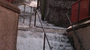 <p>Water flowing down the Fever Hospital steps after a burst water main - Cork is a city of many steps, especially on the northside, says Jo Kerrigan.</p>