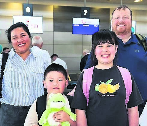 Nhung Nguyen, Dara, Emma, and James Galvin, Blackrock, pictured at Cork Airport for the inaugural TUI flight to Corfu. Picture: Alison Miles
                    