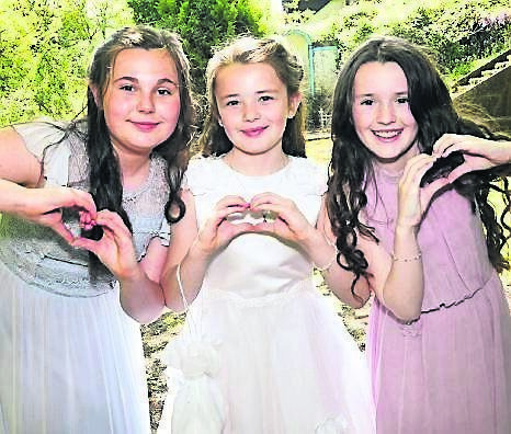Liliana Duggan, Scoil Bhríde Girls Primary School, celebrating her First Holy Communion with her sisters Amelie and Isabelle, at St Brigid’s Church, Crosshaven. Picture: Siobhán Russell
Liliana Duggan, Scoil Bhríde Girls Primary School, celebrating her First Holy Communion with her sisters Amelie and Isabelle, at St Brigid’s Church, Crosshaven. Picture: Siobhán Russell