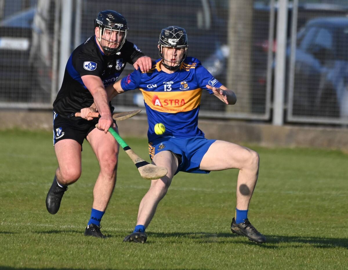Carrigaline's Tomas Vaughan and Sarsfields' Kieran Walsh in Red FM HL Division 1 action at Carrigaline. Picture: Eddie O'Hare Carrigaline's Tomas Vaughan and Sarsfields' Kieran Walsh in Red FM HL Division 1 action at Carrigaline. Picture: Eddie O'Hare