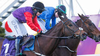 Robyn Donaghue-Leahy (blue silks) onboard Not Just Any Eagle comes home to win ahead of Jody Townend (red and purlpe silks) onbo