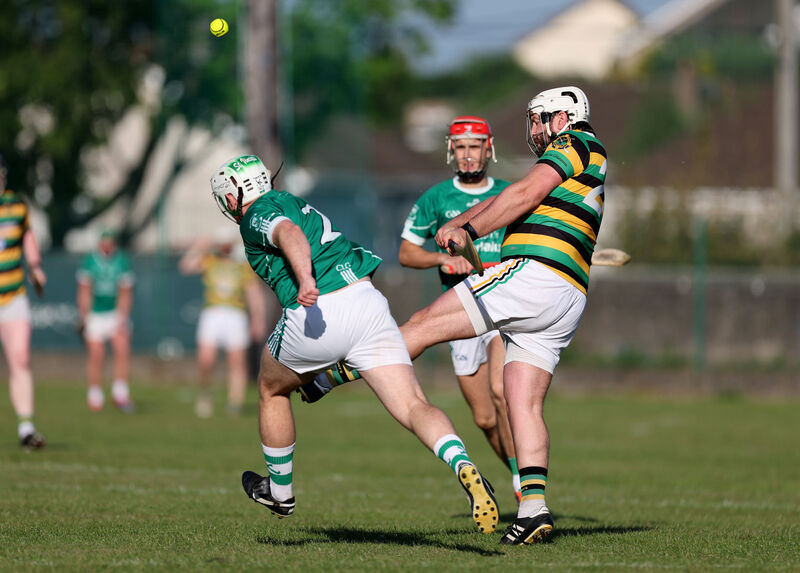 Cathal O'Brien, Glen Rovers, shoots from Adam Sorenson, St. Vincent's. Picture: Jim Coughlan. Cathal O'Brien, Glen Rovers, shoots from Adam Sorenson, St. Vincent's. Picture: Jim Coughlan.