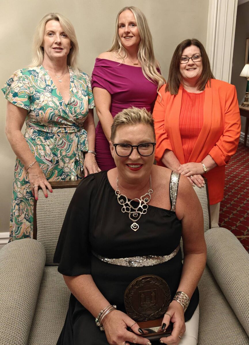 Cork County Boxing Board officers Louise Forde, Nicola Murphy, and Rose Murphy with the Cork Indoor Sports winner for boxing, Vancs O'Connell JW  