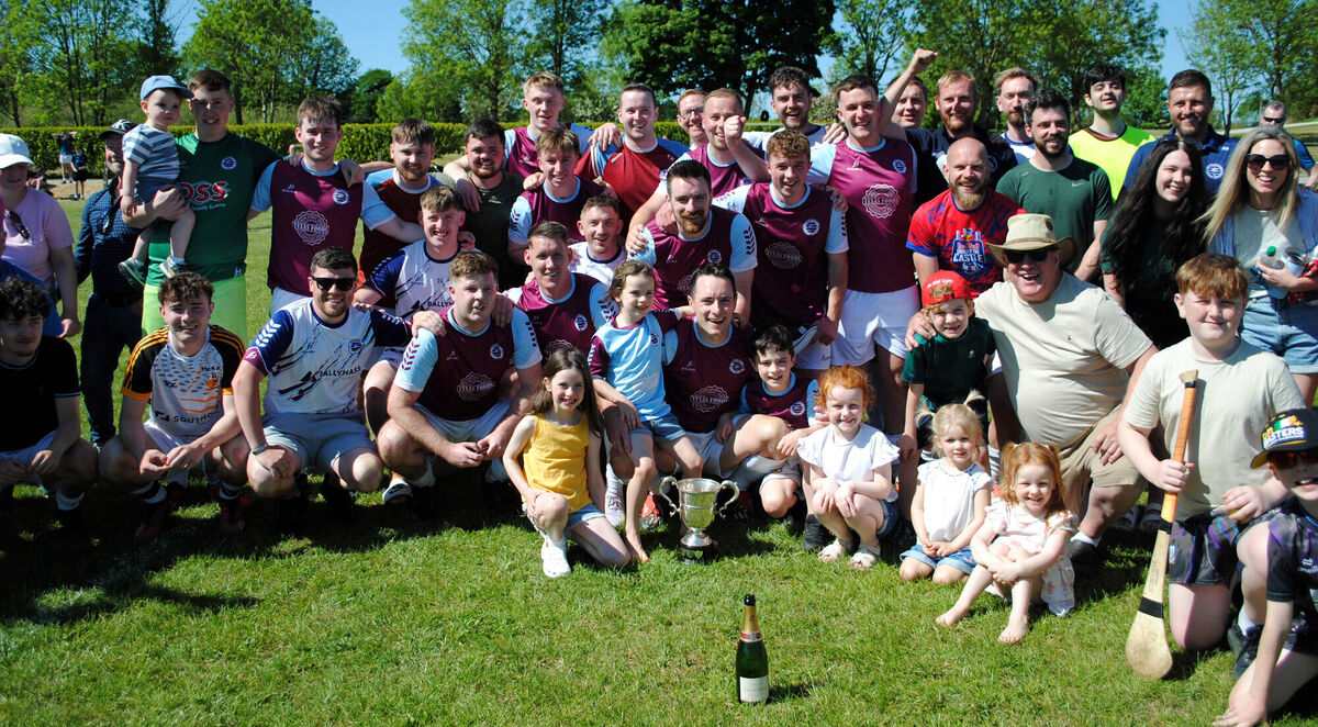 Boher Celtic players, suppoerters and familiy members, celebrate after winning the League 2 title.