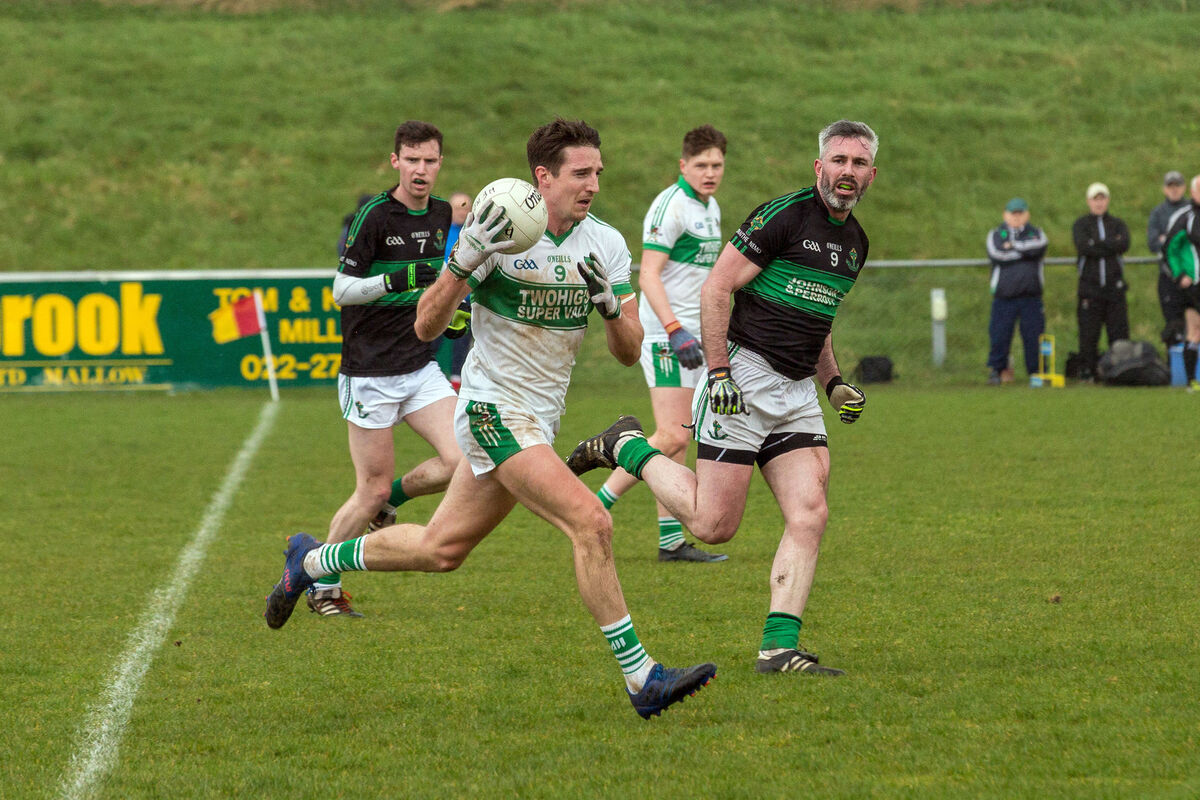 Kanturk's Aidan Walsh is followed by Nemo Rangers' David Niblock in 2018. Picture: John Delea Kanturk's Aidan Walsh is followed by Nemo Rangers' David Niblock in 2018. Picture: John Delea