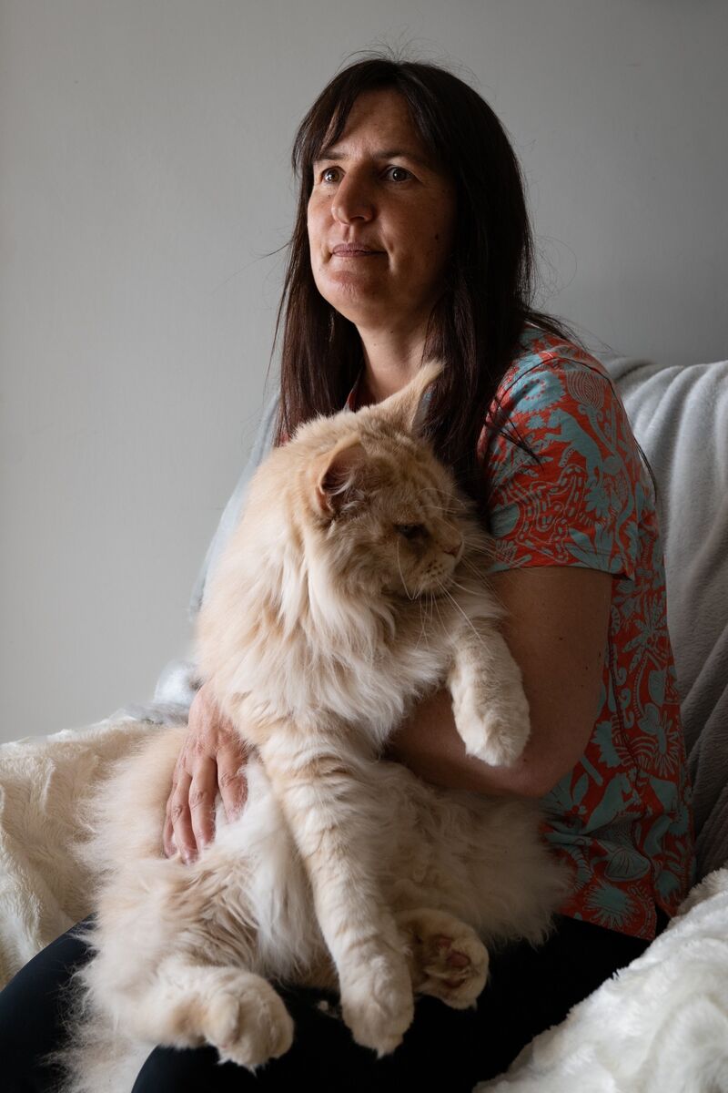 Claudia Wagner pictured in the hallway of her home, holding one of her beloved 15 cats. Picture Chani Anderson Claudia Wagner pictured in the hallway of her home, holding one of her beloved 15 cats. Picture Chani Anderson