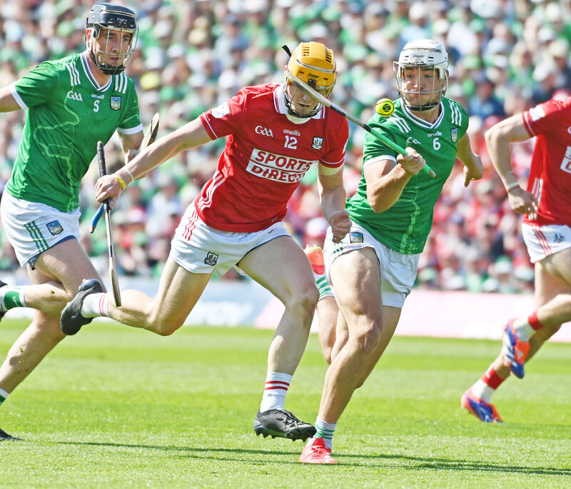 Cork's Shane Barrett is held up by Limerick's Kyle Hayes. Picture: Eddie O'Hare