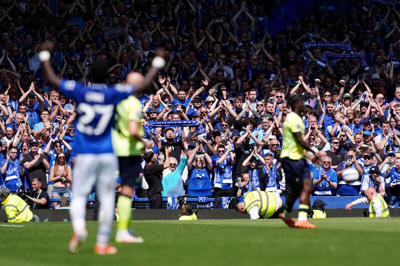Everton fans celebrates as the final whistle is blown during the  final Premier League match at Goodison Park, Liverpool. Picture: Martin Rickett/PA Wire.