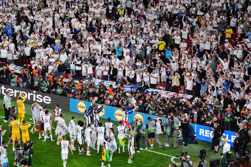 Tottenham Hotspur players celebrate with fans following the UEFA Europa League final at the Estadio de San Mames, Bilbao, Spain. Picture: Andrew Milligan/PA Wire