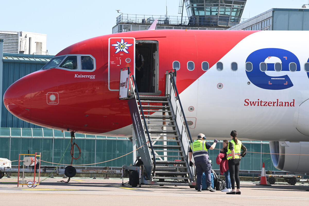 Ground crew assist with boarding an edelweiss aircraft at Cork Airport. Picture Larry Cummins Ground crew assist with boarding an edelweiss aircraft at Cork Airport. Picture Larry Cummins