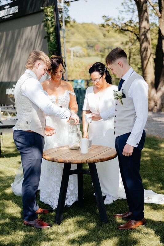 "Our highlight was our sand ceremony, symbolising the blending of our families into one, a meaningful touch for our blended family," the couple said. 