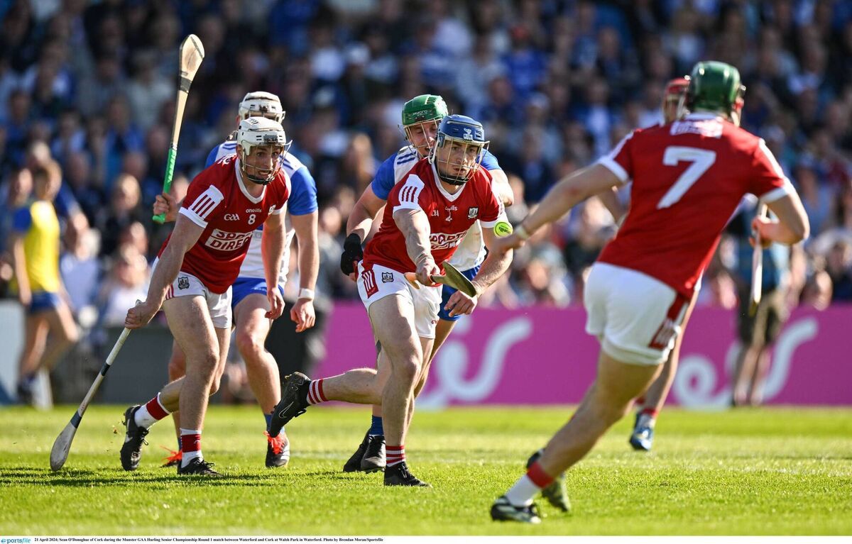 Cork defender Sean O'Donoghue pops a pass to Mark Coleman against Waterford at Walsh Park. Picture: Brendan Moran/Sportsfile