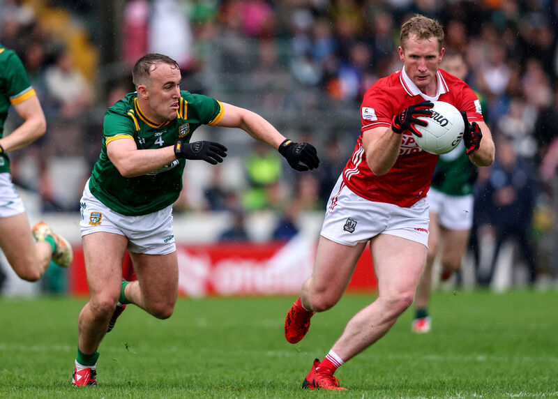Cork's Ruairí Deane tries to get away from Ronan Ryan of Meath. Picture: INPHO/Ben Brady