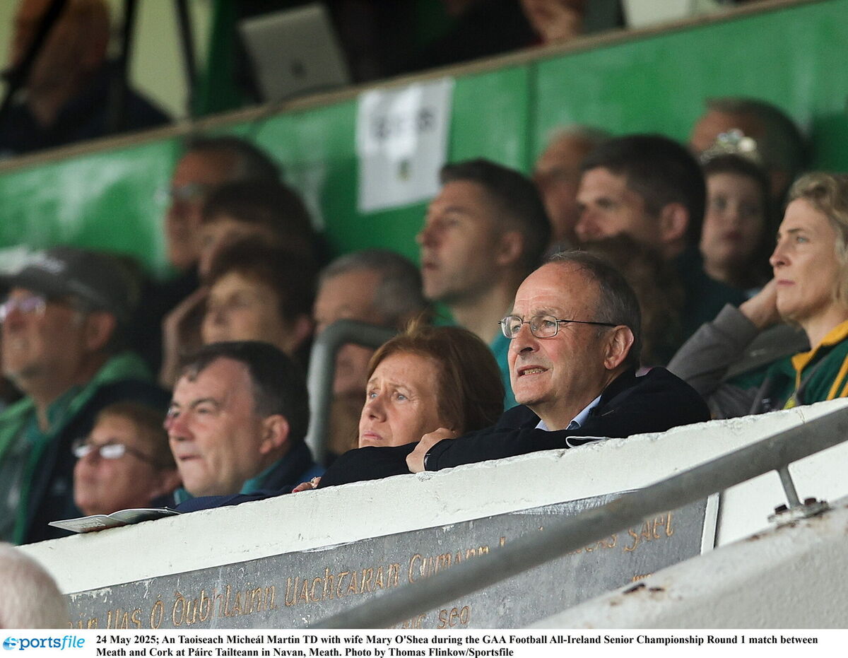 Taoiseach Micheál Martin with wife Mary O'Shea during the Meath v Cork game. Picture: Thomas Flinkow/Sportsfile