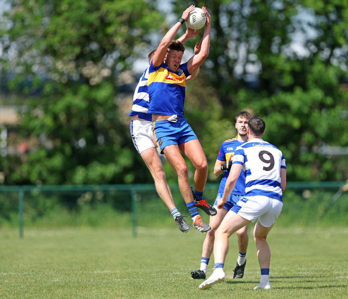 Carrigaline's Kevin Kavanagh and Andrew Whelton of Castlehaven battle for the high ball. Picture: Jim Coughlan Carrigaline's Kevin Kavanagh and Andrew Whelton of Castlehaven battle for the high ball. Picture: Jim Coughlan