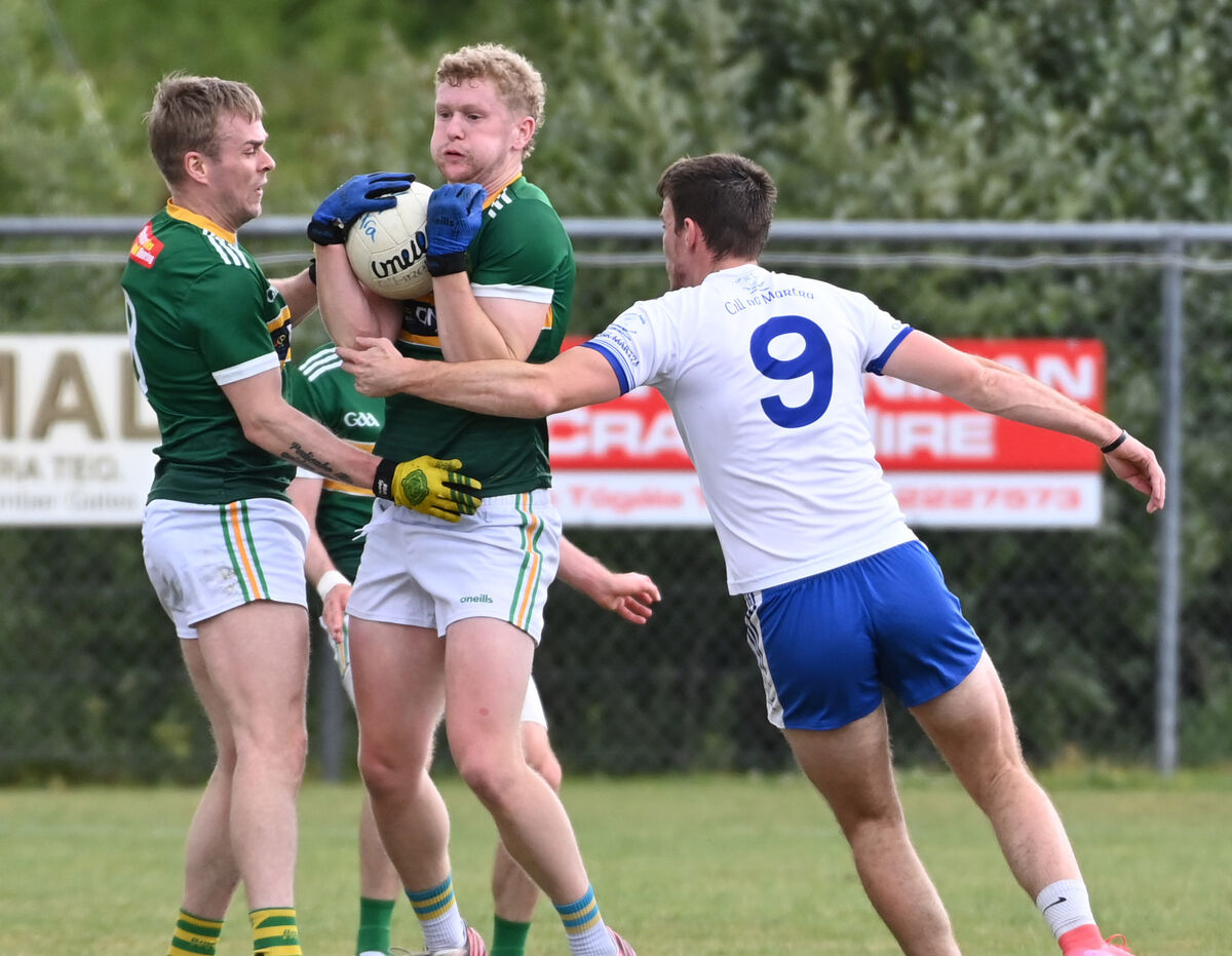 St Michael's Rory O'Shaughnessy is tackled by Cill na Martra's Gearóid Ó Goillidhe. Picture: Eddie O'Hare