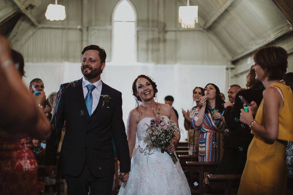 Chani and David on their wedding day at Mount Druid in 2016: ‘We didn’t want the norm, it wasn’t about a fancy sit down dinner or the dresses — I got my wedding dress online.’ Chani and David on their wedding day at Mount Druid in 2016: ‘We didn’t want the norm, it wasn’t about a fancy sit down dinner or the dresses — I got my wedding dress online.’