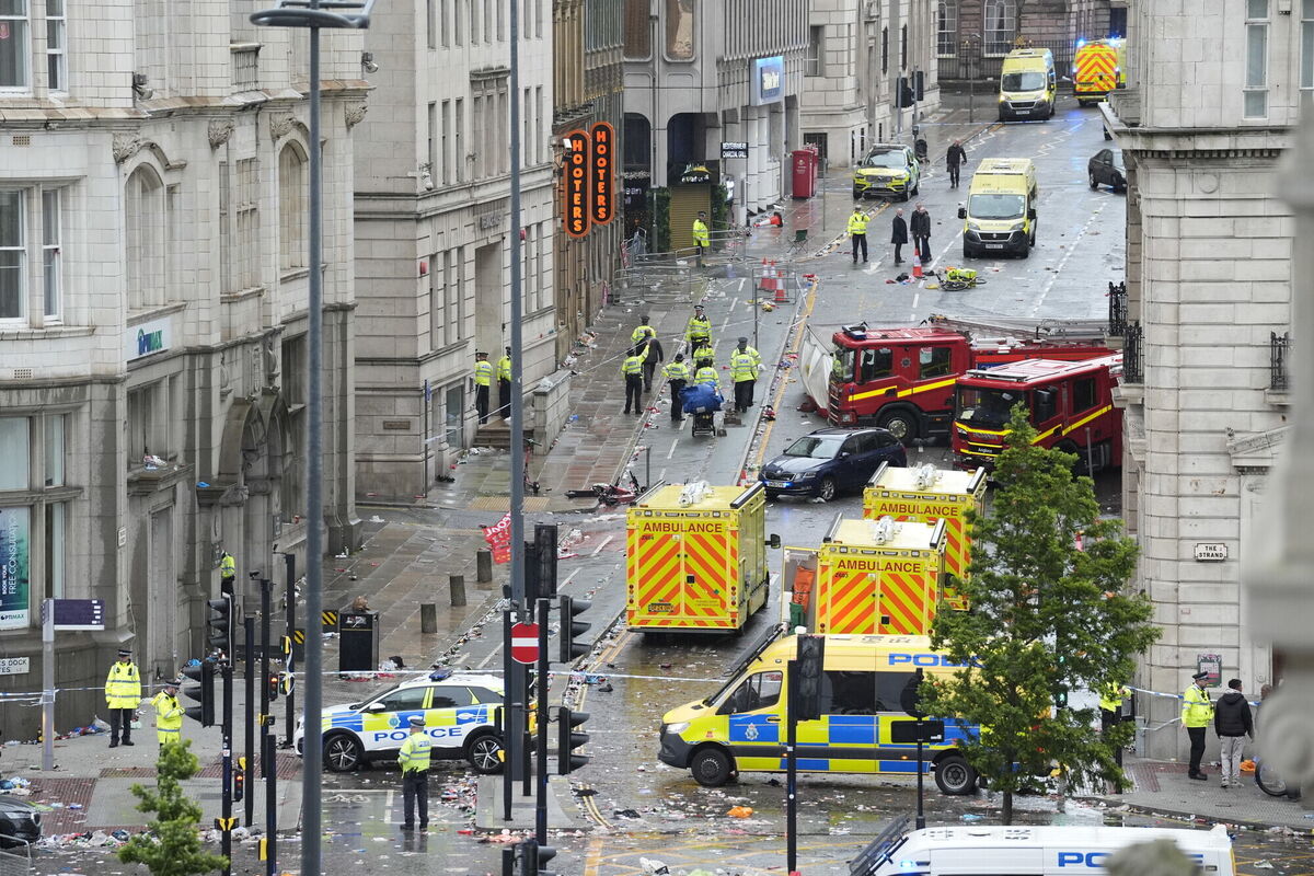 Police and emergency personnel dealing with a road traffic accident on Water Street near the Liver Building in Liverpool. Police and emergency personnel dealing with a road traffic accident on Water Street near the Liver Building in Liverpool.