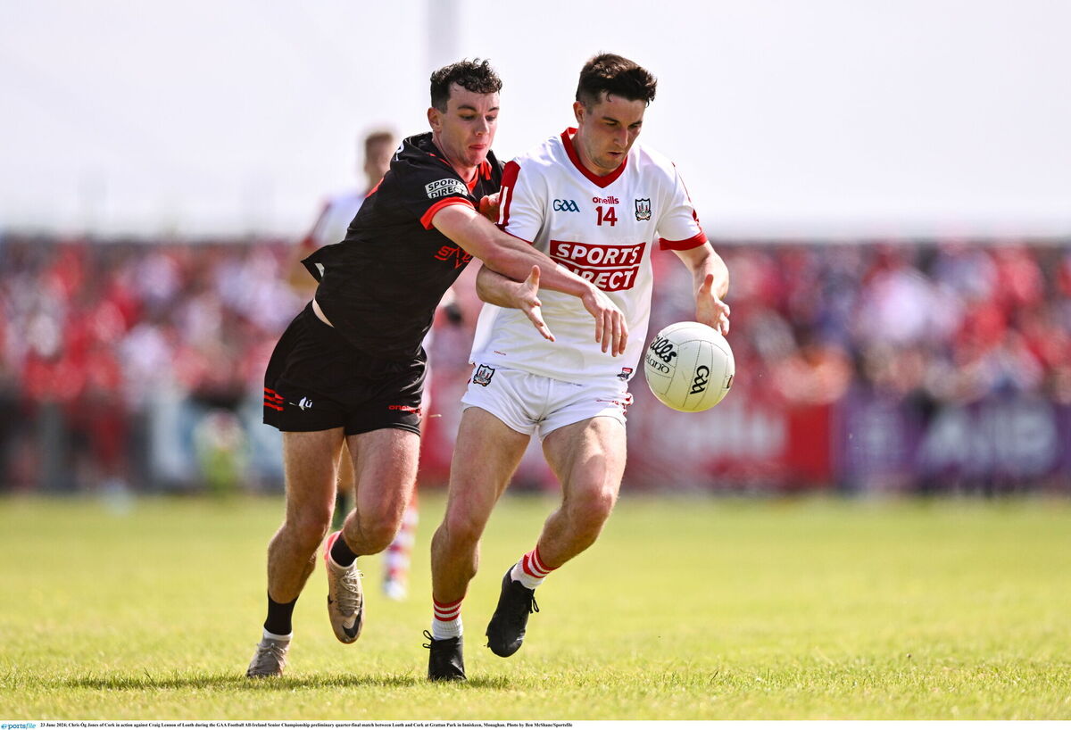 Chris Óg Jones of Cork in action against Craig Lennon of Louth last year. Picture: Ben McShane/Sportsfile