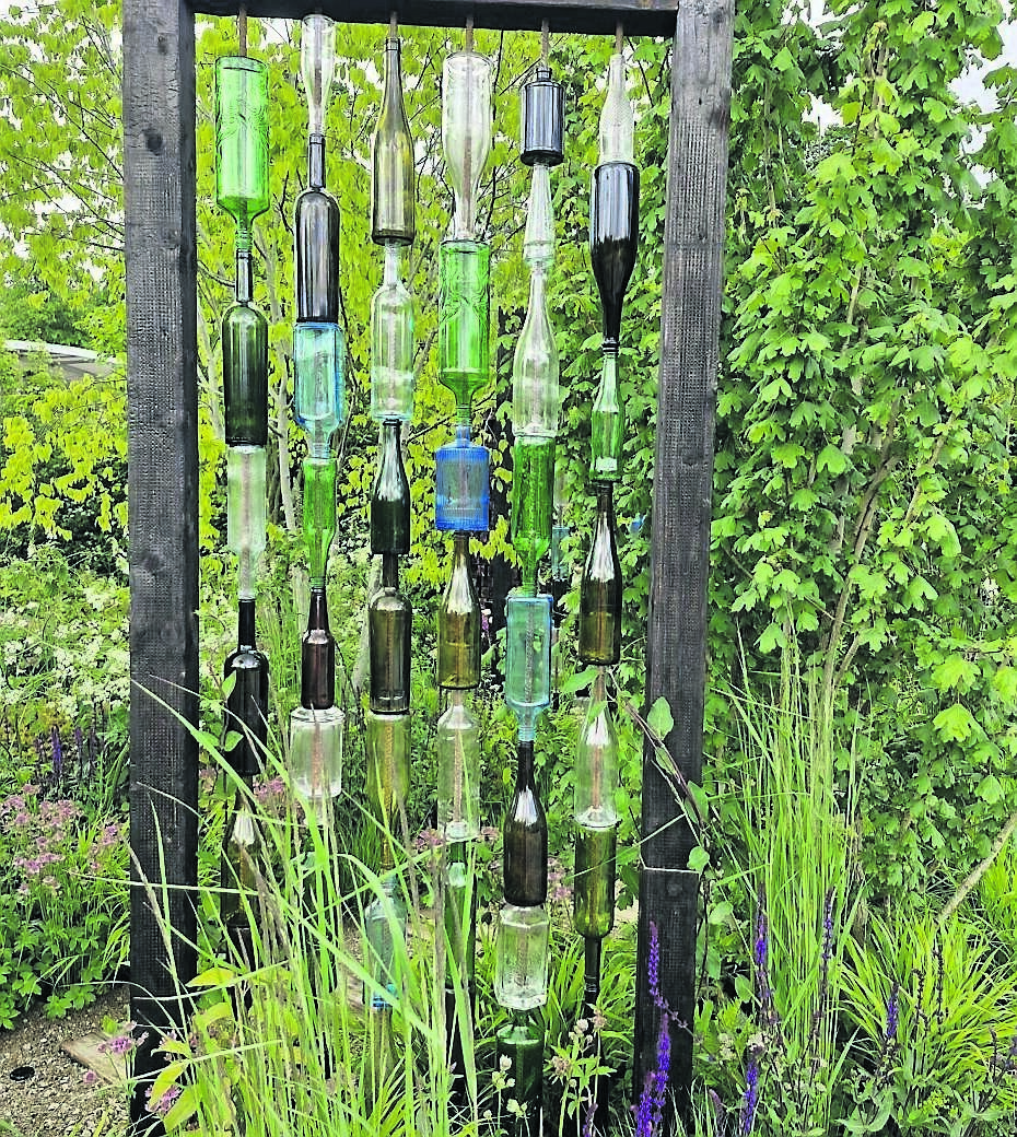 A recycled bottle sculpture creating an attractive focal point in James Purdy’s ‘Most Sorted Garden’ at Bloom this weekend