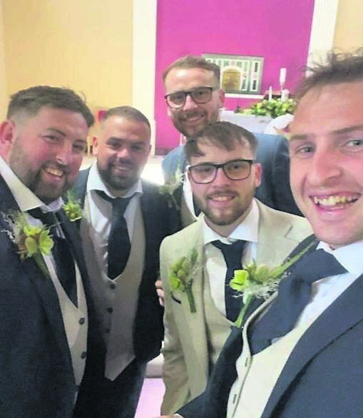 Groom Adam Hurley with his groomsmen - his four brothers Scott, Jason, Craig, and Shane 